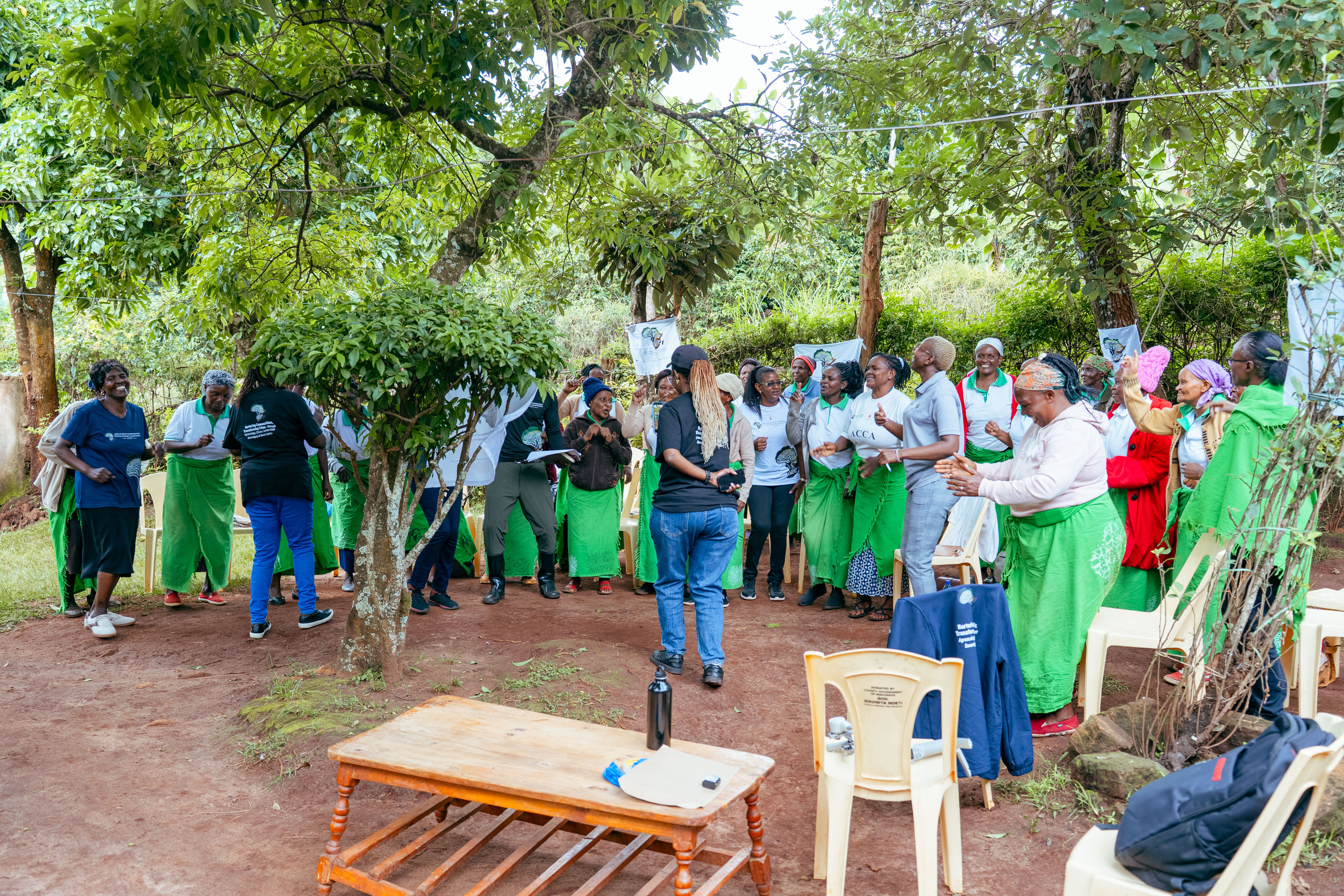 ART team and community members — farmers and community members interacting, women and youth participation in field activities